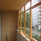 Остекление балкона деревом